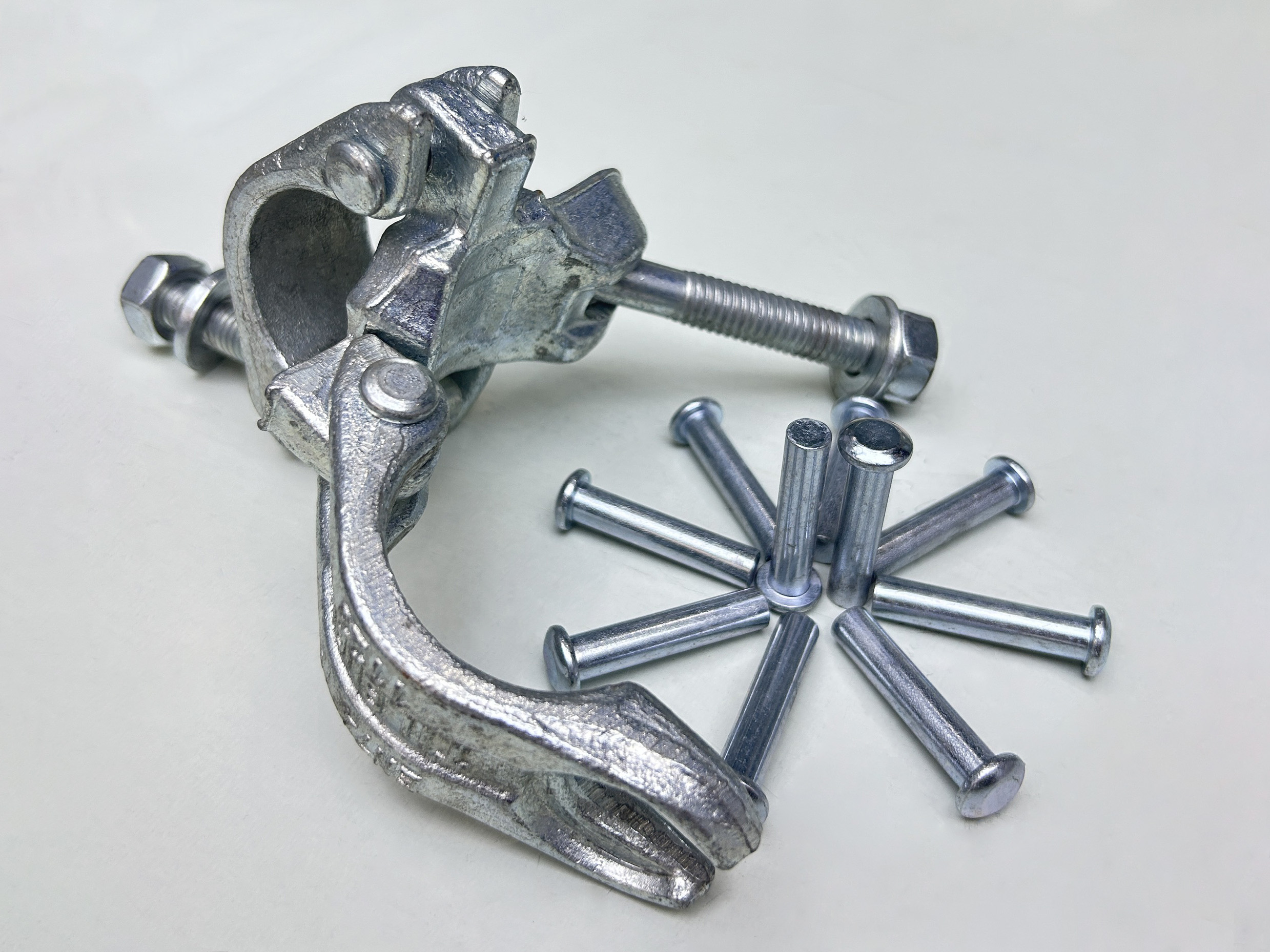 Double coupler base rivet